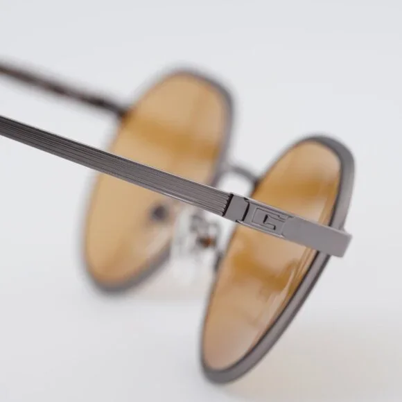 Guess GU00207 09E Sunglasses Gunmetal Round Frame, Brown Lenses